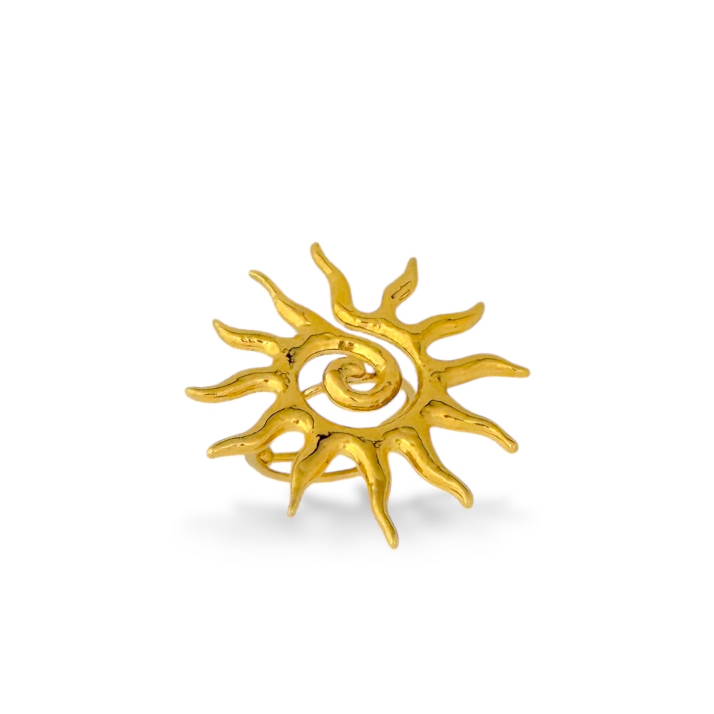 Gold ring shaped like a sunburst with a swirling center and radiating abstract rays.
