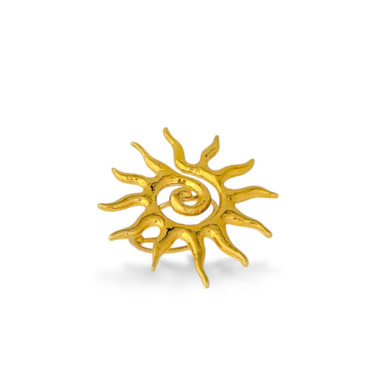 Gold ring shaped like a sunburst with a swirling center and radiating abstract rays.
